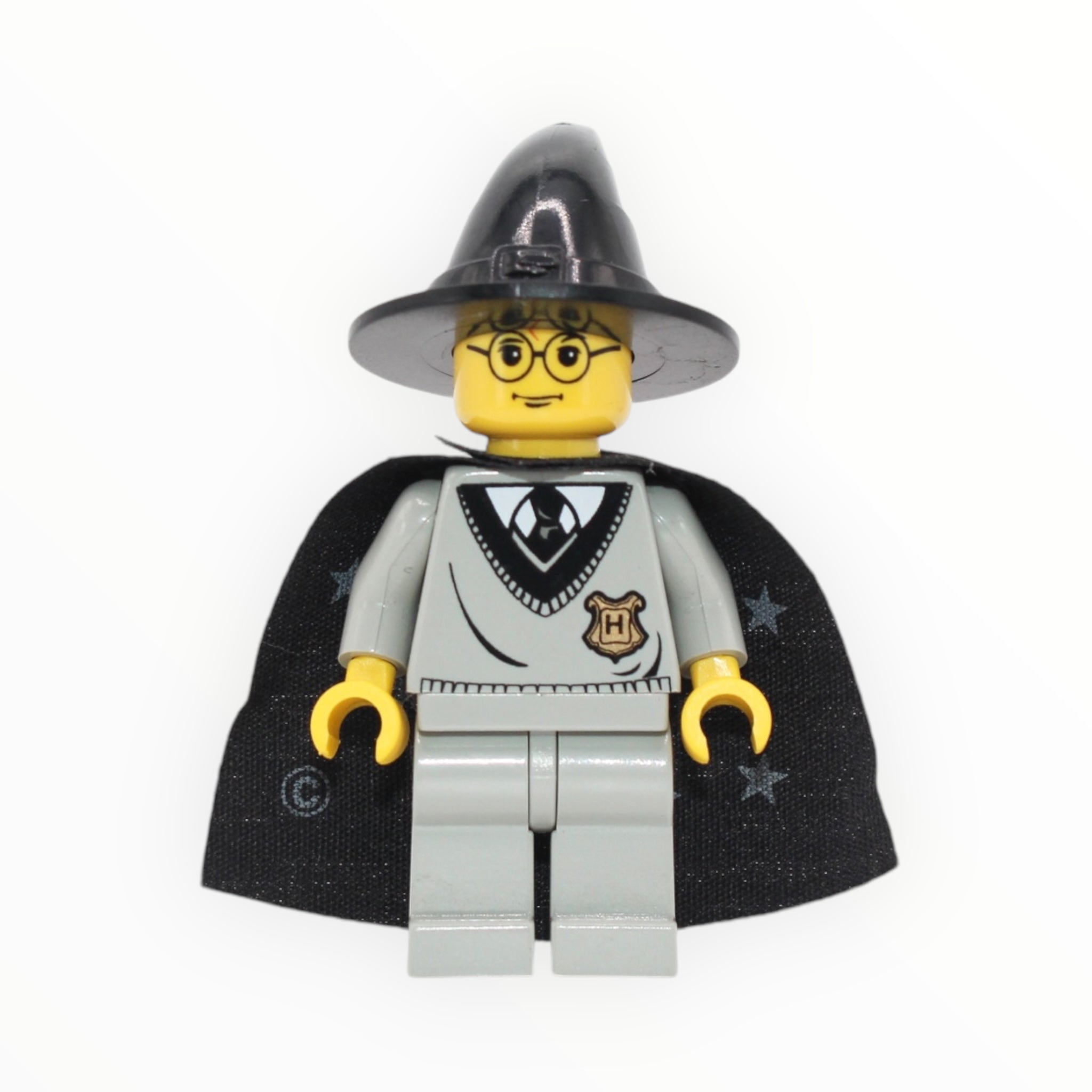 Harry Potter (Hogwarts sweater, star cape, yellow skin, black hat)